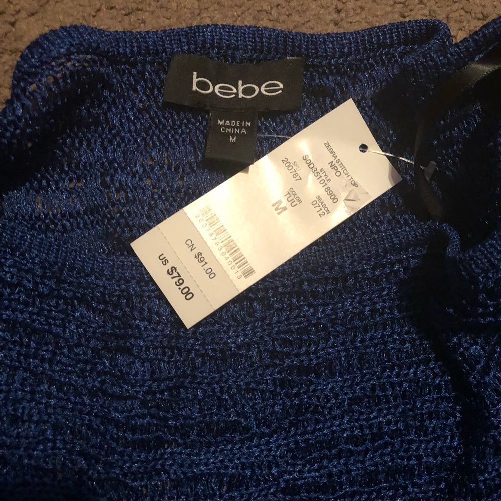 Bebe medium top size medium. Never been used NWT